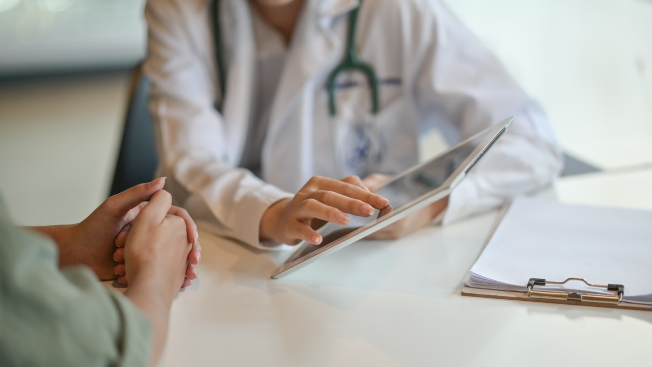 Medical specialists reviewing patient information